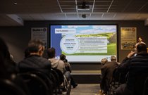 A presenter giving a talk